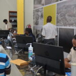 UDLS staff attending to clients at the main branch in Kampala